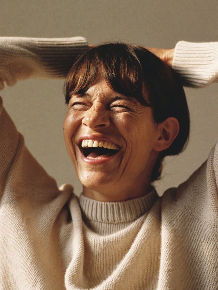 Woman in her 50s smiling