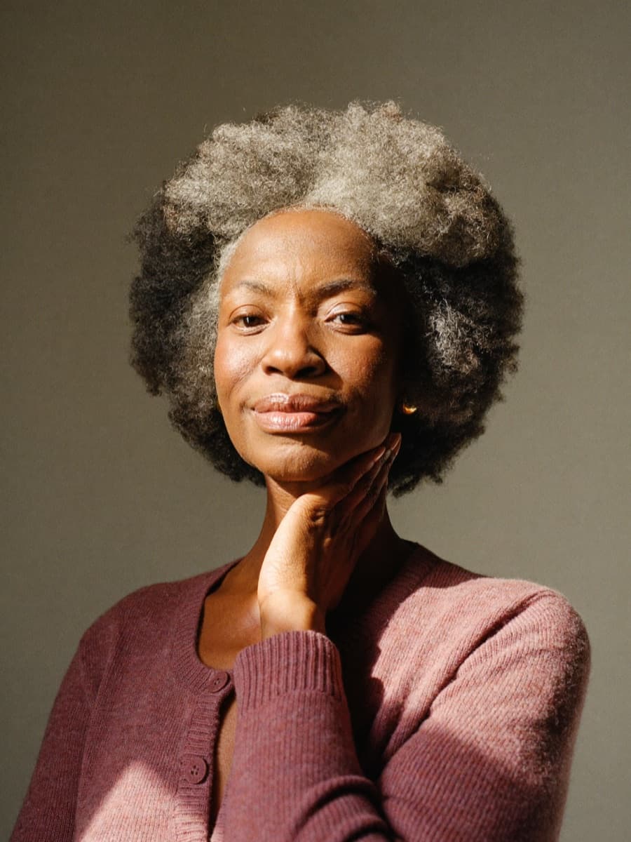 Elegant woman with silver curls